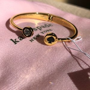 Kate Spade gold bracelet with black spade ♠️.